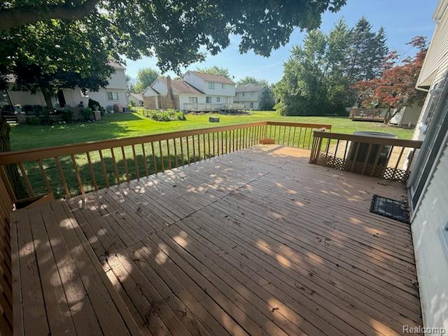 28144 Yorktown Road Farmington, MI 48331 - Photo 24 of 25 Spacious wooden deck with integrated railing system