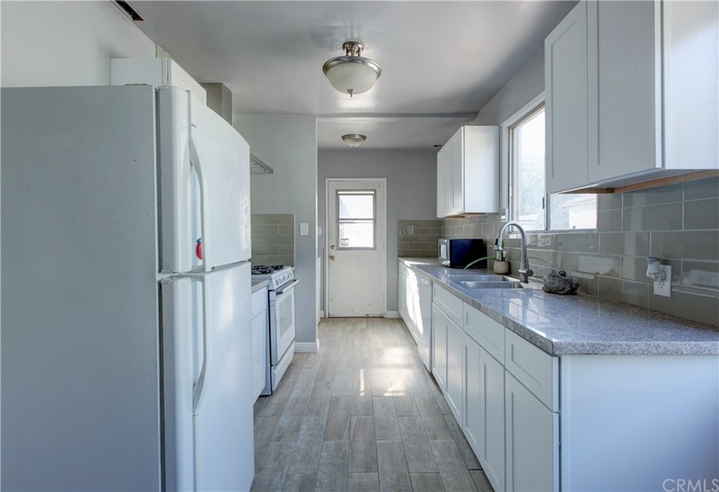 14730 Flomar Drive Whittier, CA 90603 - Photo 5 of 14 Updated Kitchen with Granite counter and new tile flooring