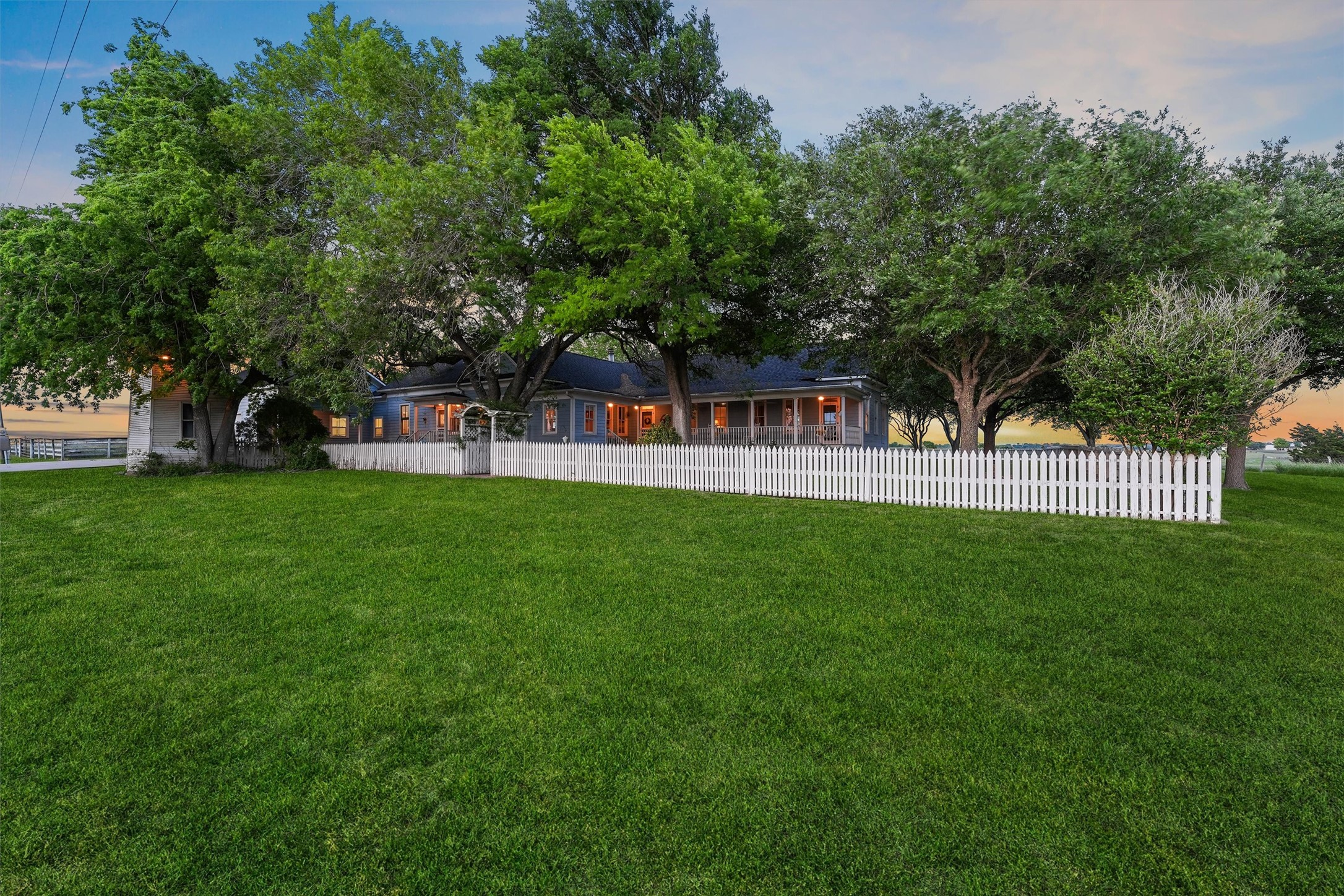 9058 Sam Houston Road Brenham, TX 77833 - Photo 27 of 50 a view of a house with a backyard porch and sitting area