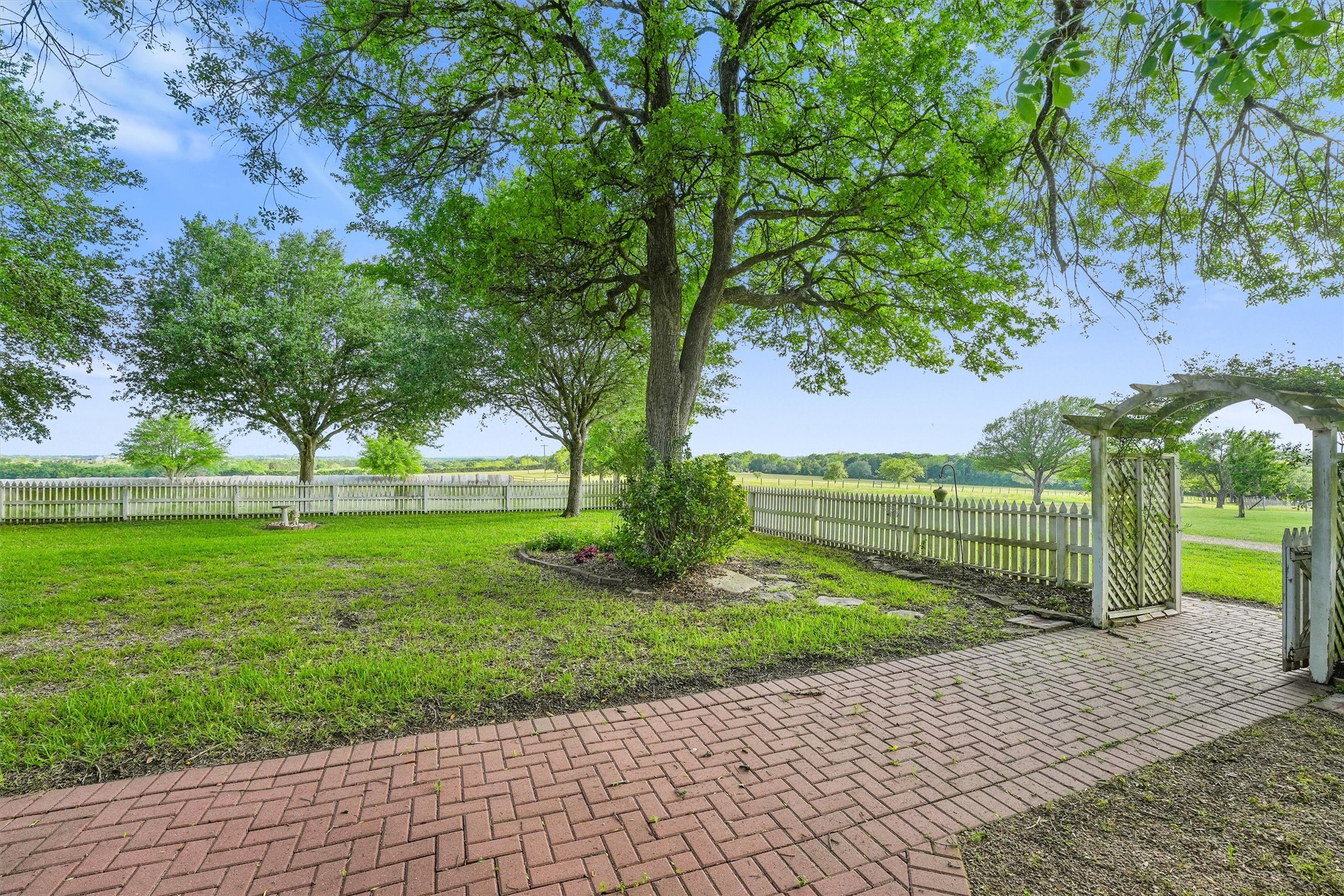 9058 Sam Houston Road Brenham, TX 77833 - Photo 46 of 50 a view of a park with large trees