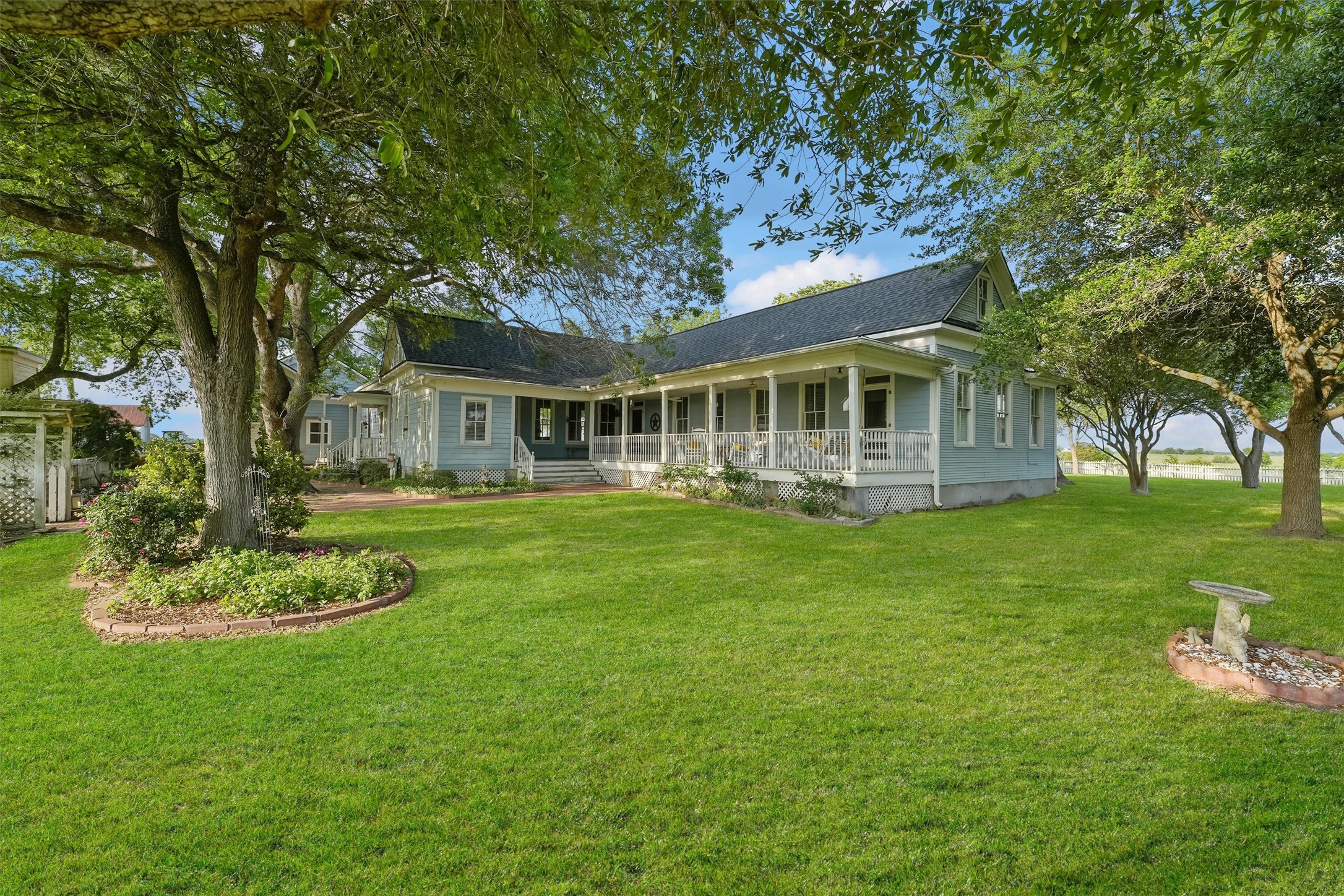 9058 Sam Houston Road Brenham, TX 77833 - Photo 7 of 50 a view of house with a garden