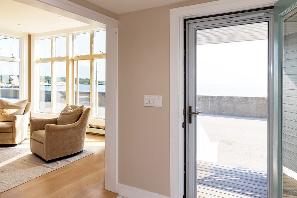 113 Glades Road Scituate, MA 02066 - Photo 11 of 41 a view of a livingroom with furniture and door