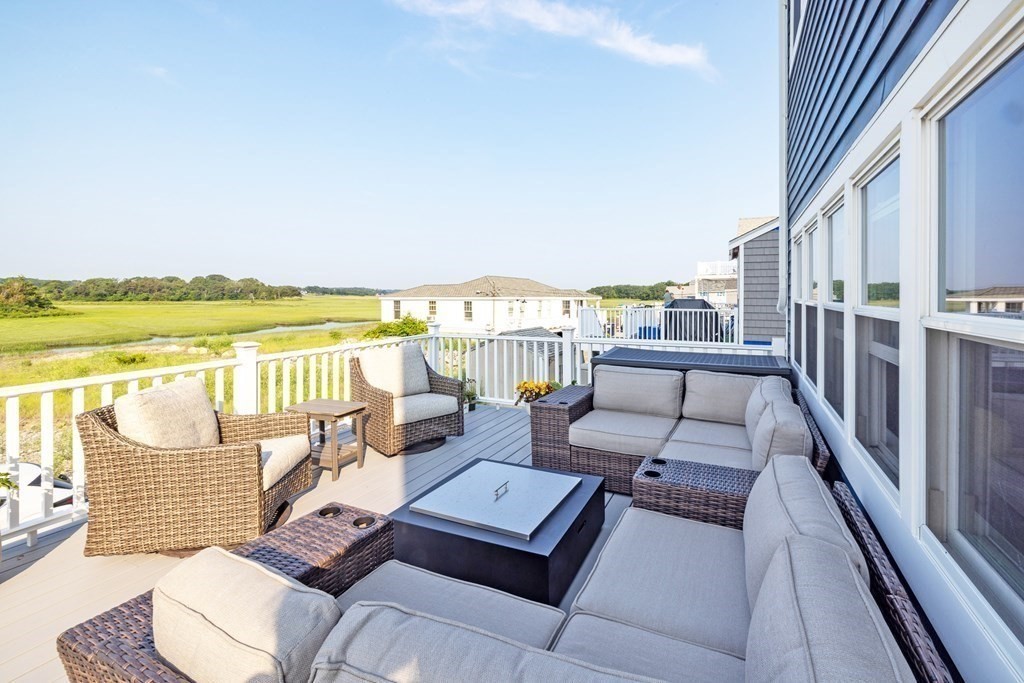 113 Glades Road Scituate, MA 02066 - Photo 2 of 41 a view of a balcony with lake view and mountain view