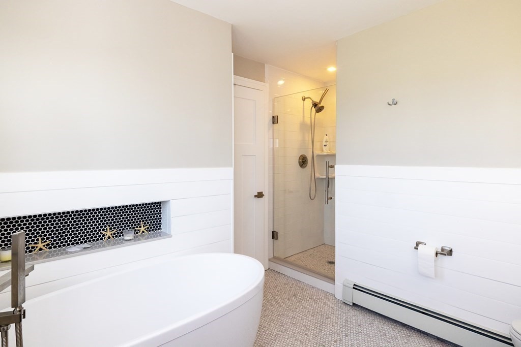 113 Glades Road Scituate, MA 02066 - Photo 28 of 41 a bathroom with a bathtub and a shower