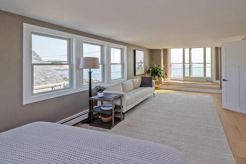 113 Glades Road Scituate, MA 02066 - Photo 32 of 41 a living room with furniture and a large window
