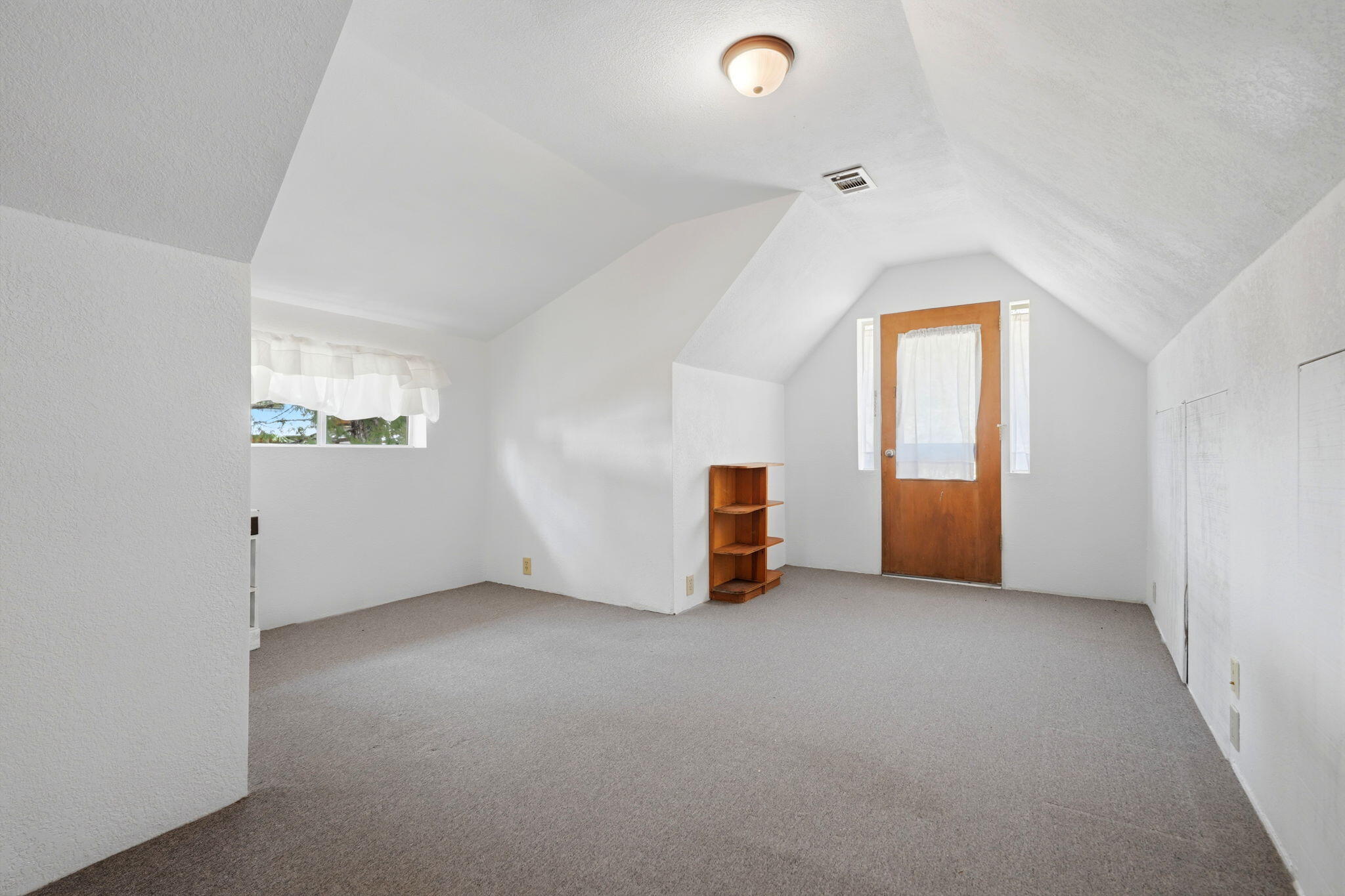 697 Loop Drive Springville, CA 93265 - Photo 33 of 55 an empty room with windows