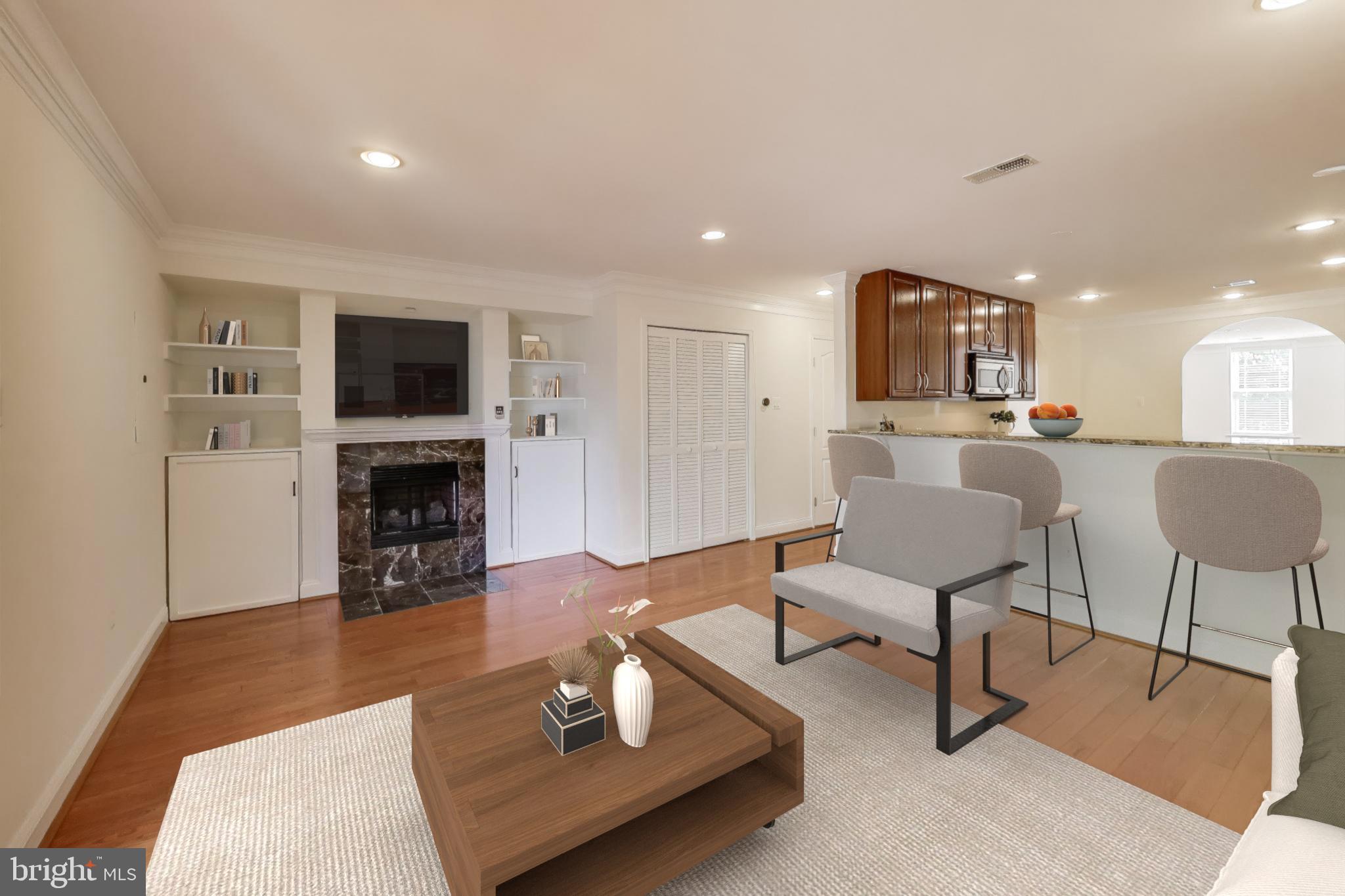 429 Shepherd Street Northwest, Unit 1 Washington, DC 20011 - Photo 17 of 41 Cozy Family Room w/Built-Ins - Virtually Staged