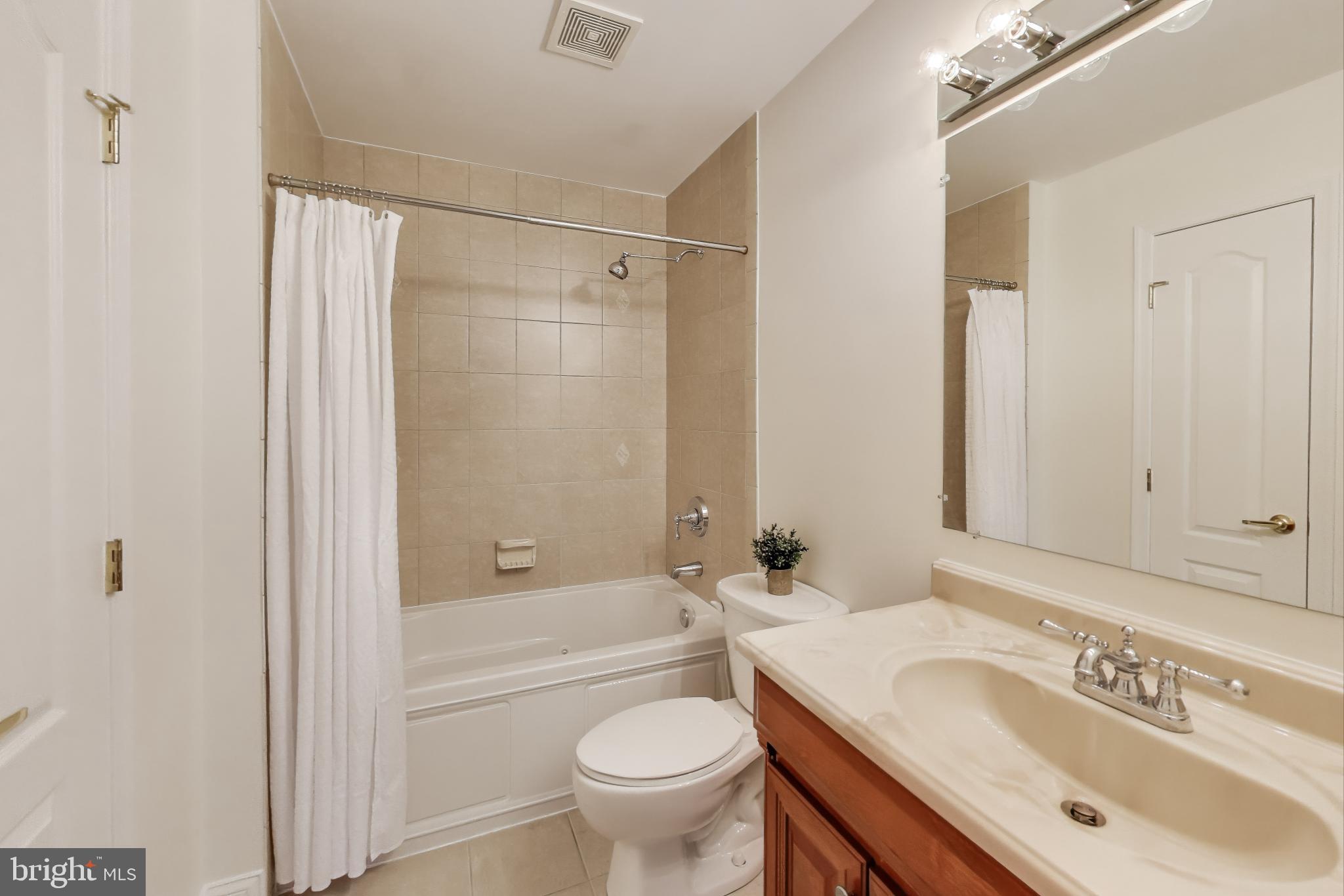 429 Shepherd Street Northwest, Unit 1 Washington, DC 20011 - Photo 26 of 41 Second Bedroom with Ensuite Full Bathroom