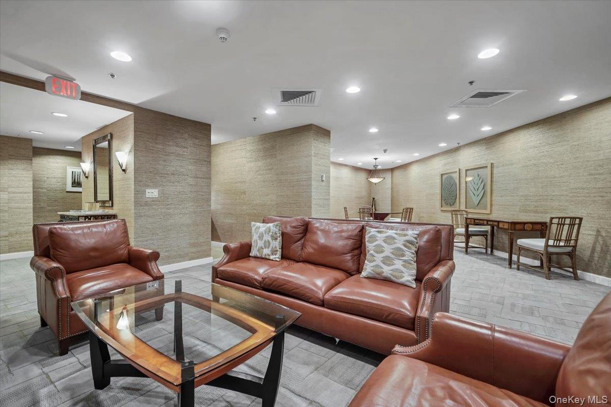 1 Renaissance Square, Unit 12E White Plains, NY 10601 - Photo 19 of 25 a living room with furniture