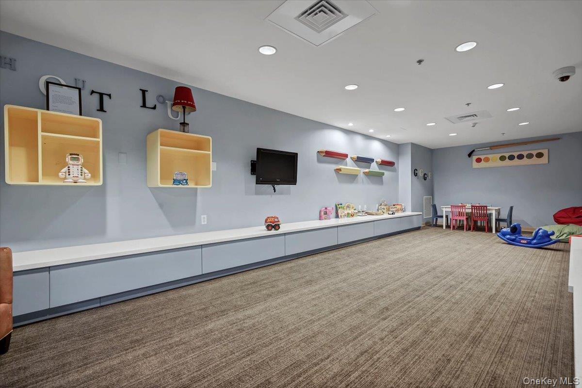 1 Renaissance Square, Unit 12E White Plains, NY 10601 - Photo 23 of 25 a view of a livingroom with furniture