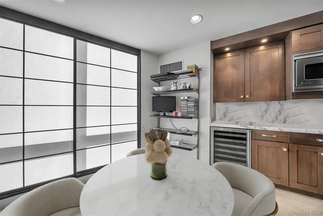 a kitchen with appliances cabinets and a sink