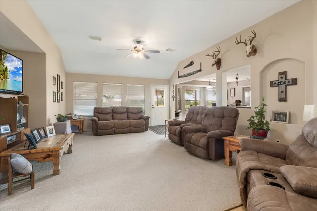 a living room with furniture and a couch