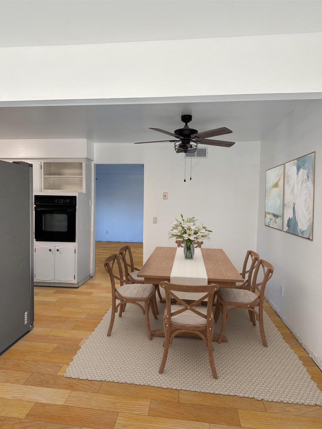1319 Adler Drive Clovis, CA 93612 - Photo 4 of 20 a view of a livingroom with furniture and a flat screen tv