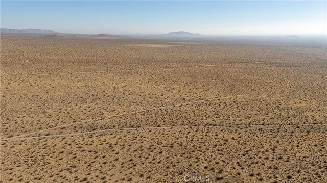 a view of an empty room with mountain