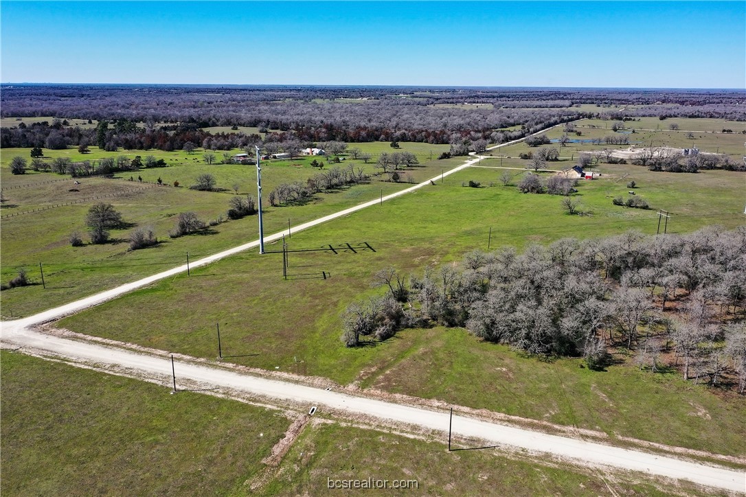 3702 Hidden Trail North Zulch, TX 77872 - Photo 6 of 19 an aerial view of a golf course with a yard