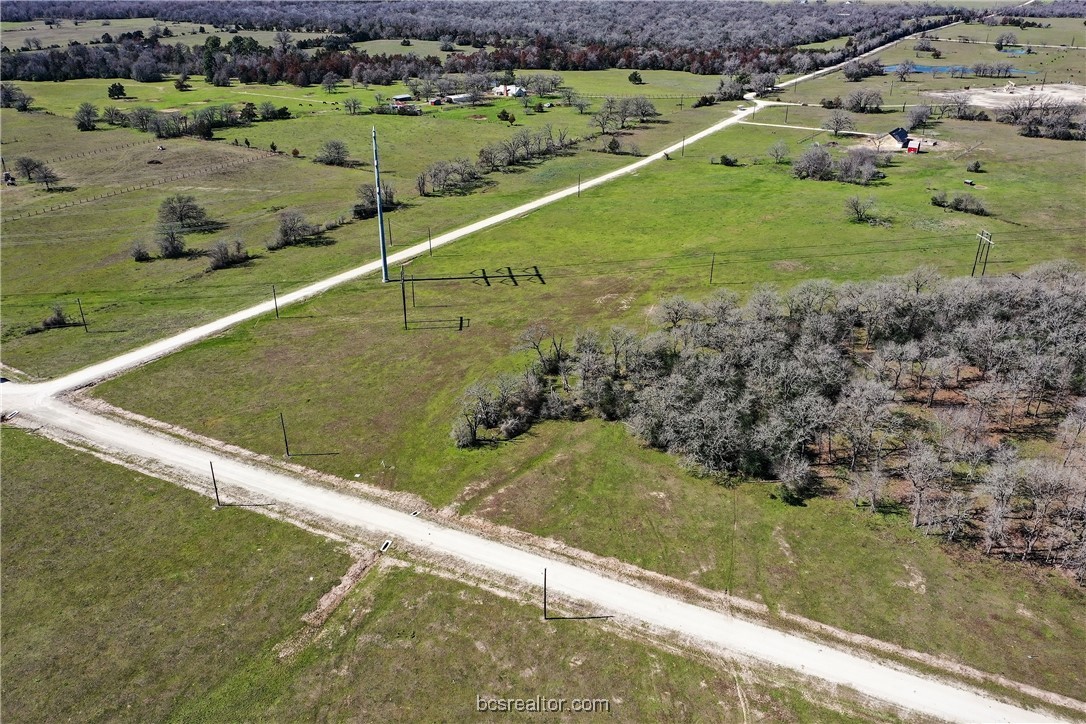 3702 Hidden Trail North Zulch, TX 77872 - Photo 7 of 19 a view of a pool with a yard
