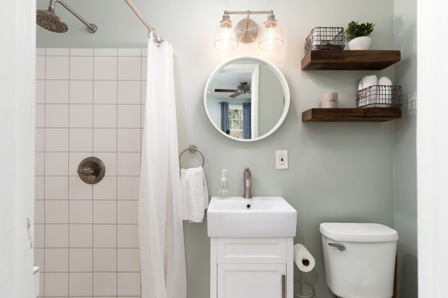 a bathroom with a toilet and a sink