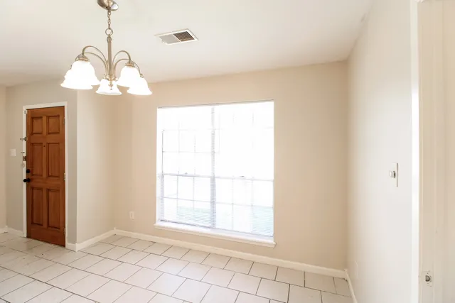 a view of a room with windows