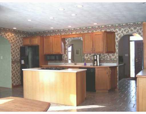 942 Mallisee Road Plum, PA 15239 - Photo 5 of 8 Kitchen. Kitchen with island cook top