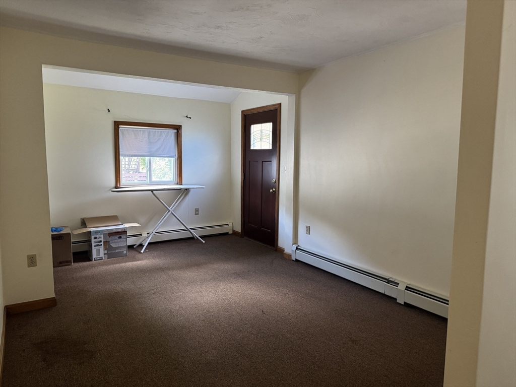 17 Thenius Street Worcester, MA 01607 - Photo 14 of 24 an empty room with windows