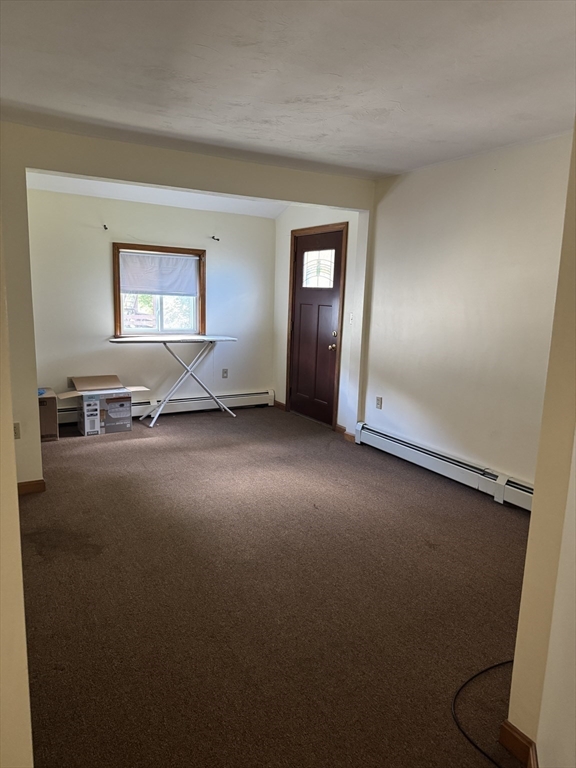 17 Thenius Street Worcester, MA 01607 - Photo 16 of 24 an empty room with windows