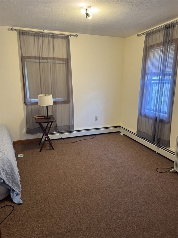 17 Thenius Street Worcester, MA 01607 - Photo 17 of 24 a view of room with air conditioner and window