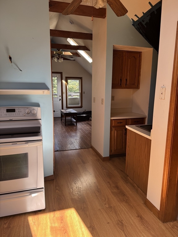 17 Thenius Street Worcester, MA 01607 - Photo 6 of 24 a kitchen with granite countertop a stove and a refrigerator