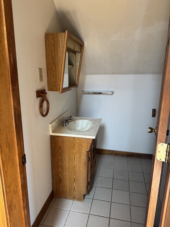 17 Thenius Street Worcester, MA 01607 - Photo 9 of 24 a bathroom with a sink and a mirror