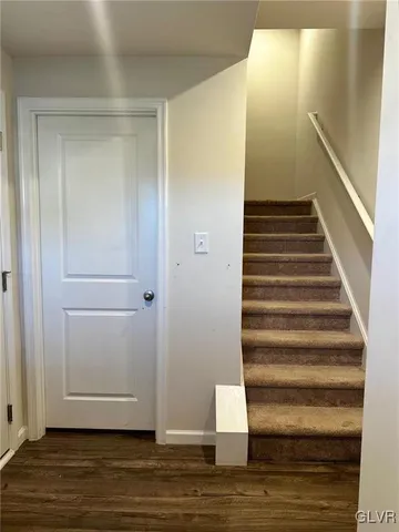 a view of entryway with wooden floor