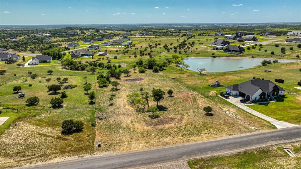 2048 Trace Ridge Drive Weatherford, TX 76087 - Photo 7 of 15 a view of a water pond