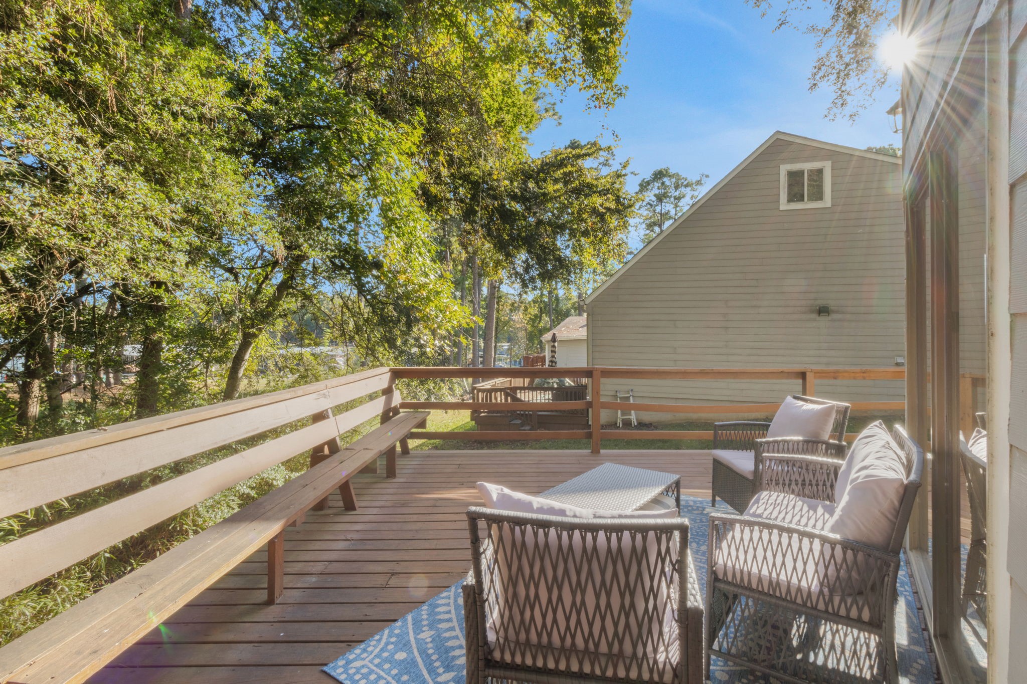 90 Harbour Lane Coldspring, TX 77331 - Photo 24 of 40 Relax on the wraparound deck and enjoy the sounds of birds, squirrels, and nearby water.