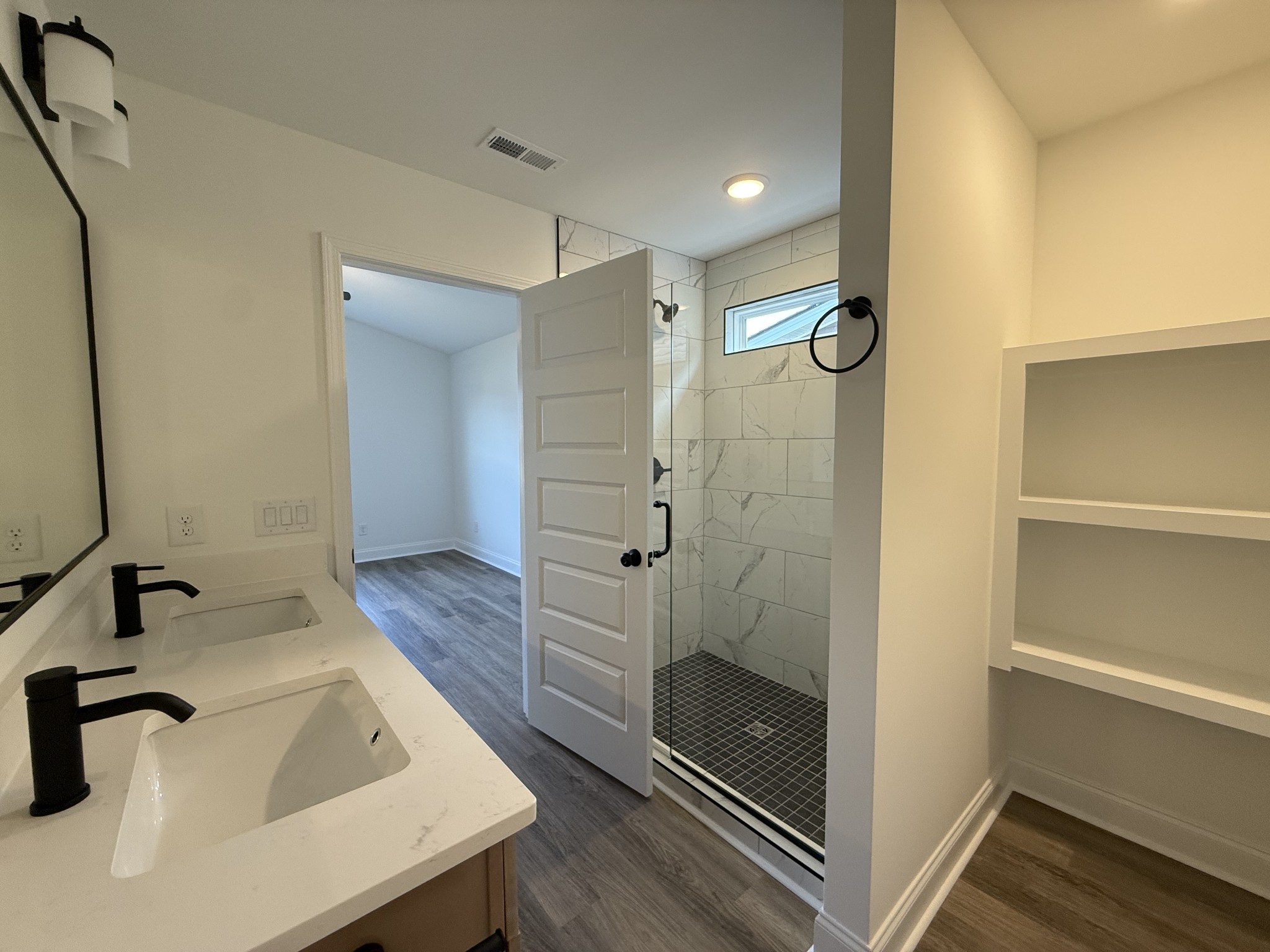 2092 Melanie Drive Springfield, TN 37172 - Photo 4 of 5 a bathroom with a sink and shower