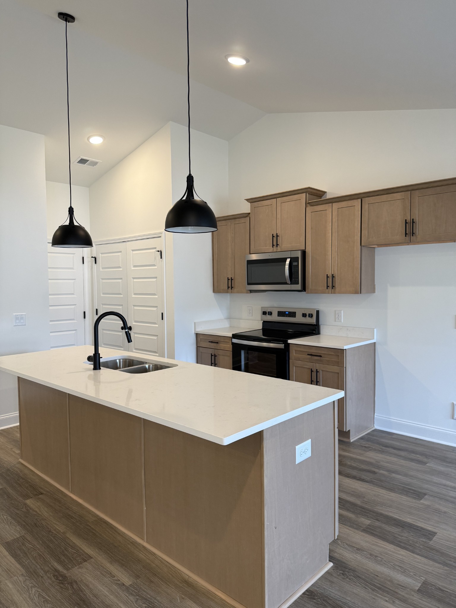 2092 Melanie Drive Springfield, TN 37172 - Photo 5 of 5 a kitchen with kitchen island a sink stainless steel appliances and cabinets
