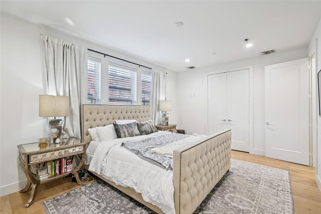 4511 Arberry Lane Dallas, TX 75219 - Photo 14 of 40 Spacious primary suite, built for relaxing and showing off.