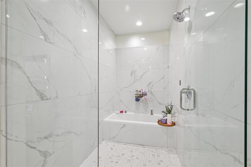 4511 Arberry Lane Dallas, TX 75219 - Photo 17 of 40 Spa-style shower and soaking tub — your friends will be jealous.