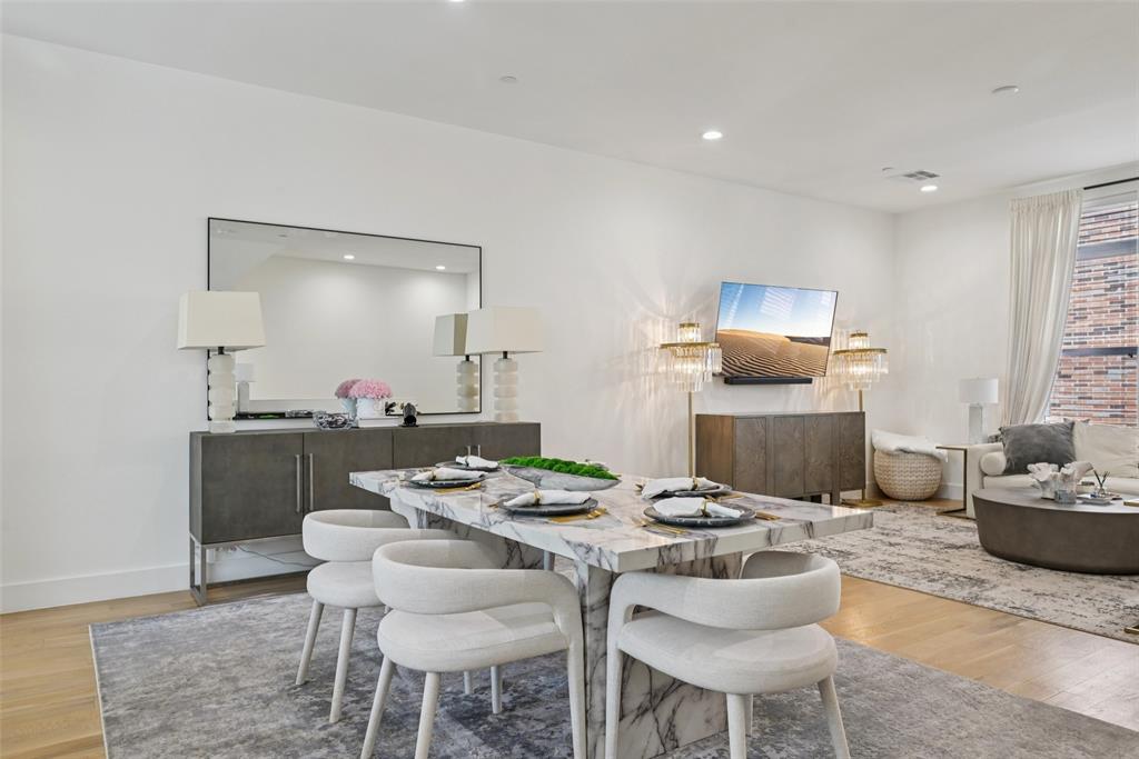 4511 Arberry Lane Dallas, TX 75219 - Photo 4 of 40 Central dining area perfectly placed for gatherings with friends.