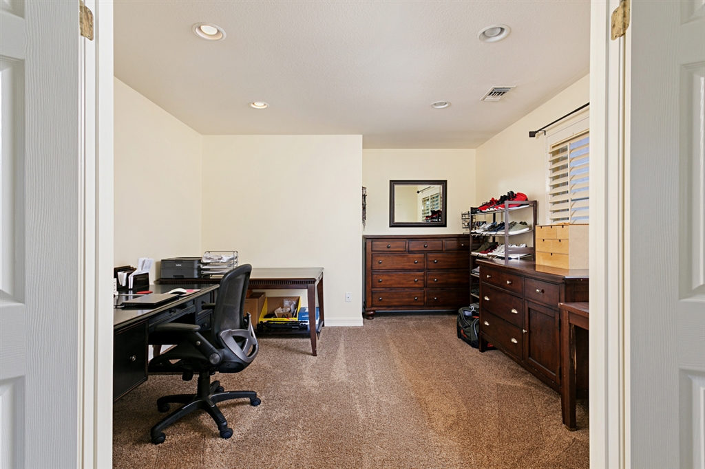 5048 Ashberry Road Carlsbad, CA 92008 - Photo 9 of 25 Large bonus room off master. Could be an office, work out room, giant closet - or convert to an extra bedroom.