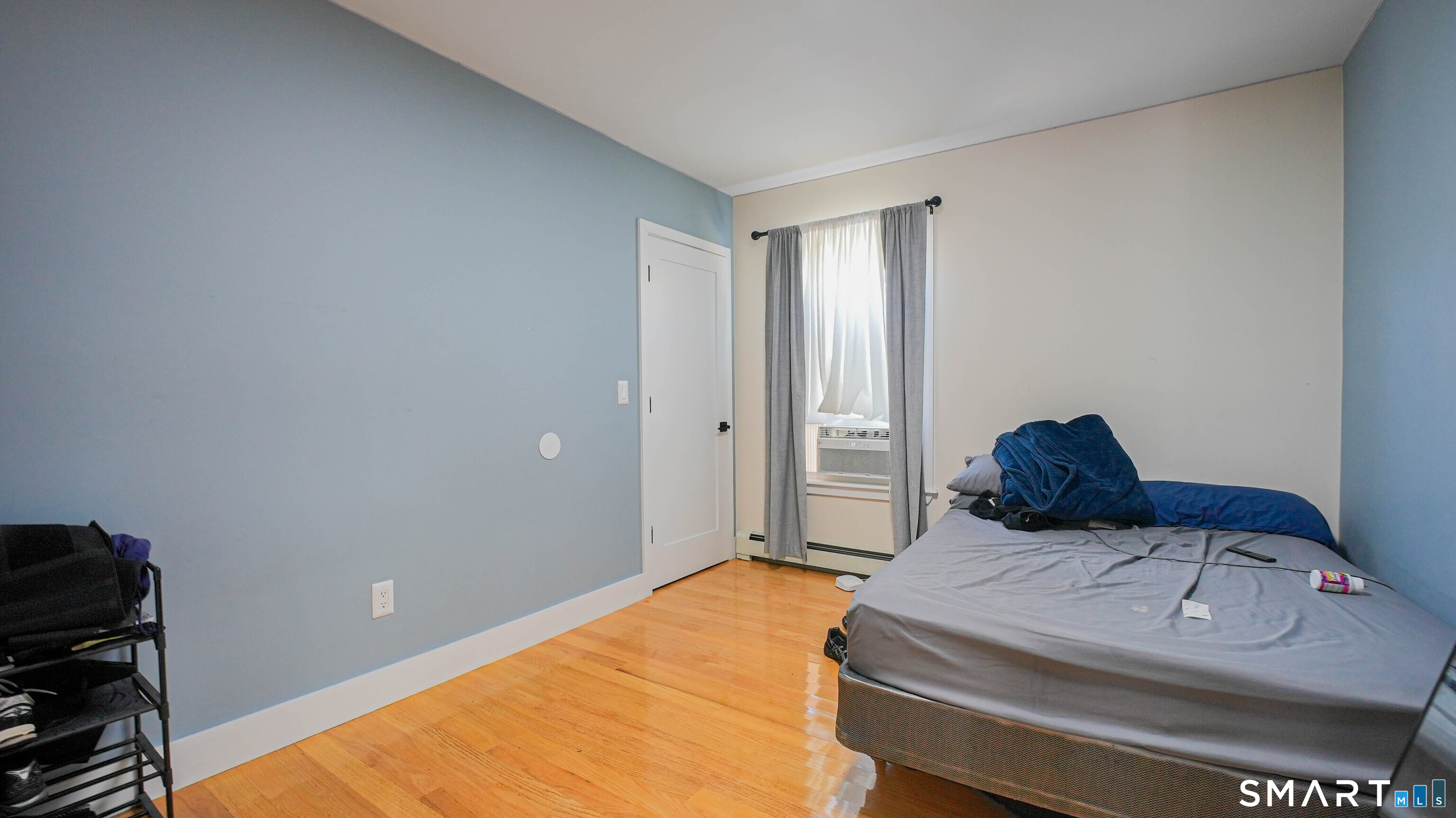 849 Frost Road Waterbury, CT 06705 - Photo 24 of 36 a bedroom with a bed and a window