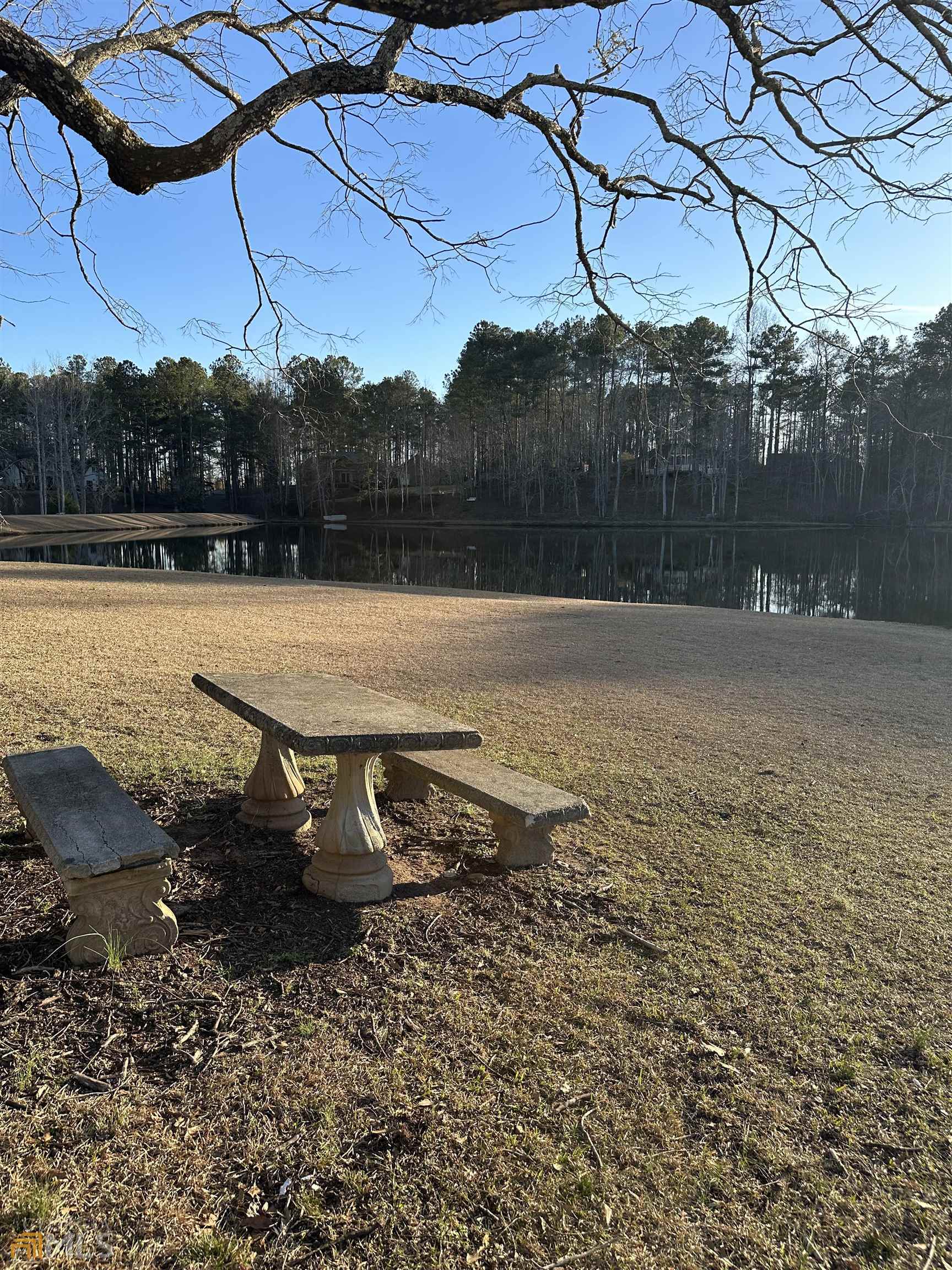 Lot 19 Mountain Ridge Drive Waverly Hall, GA 31831 - Photo 13 of 26 a view of a lake with a yard