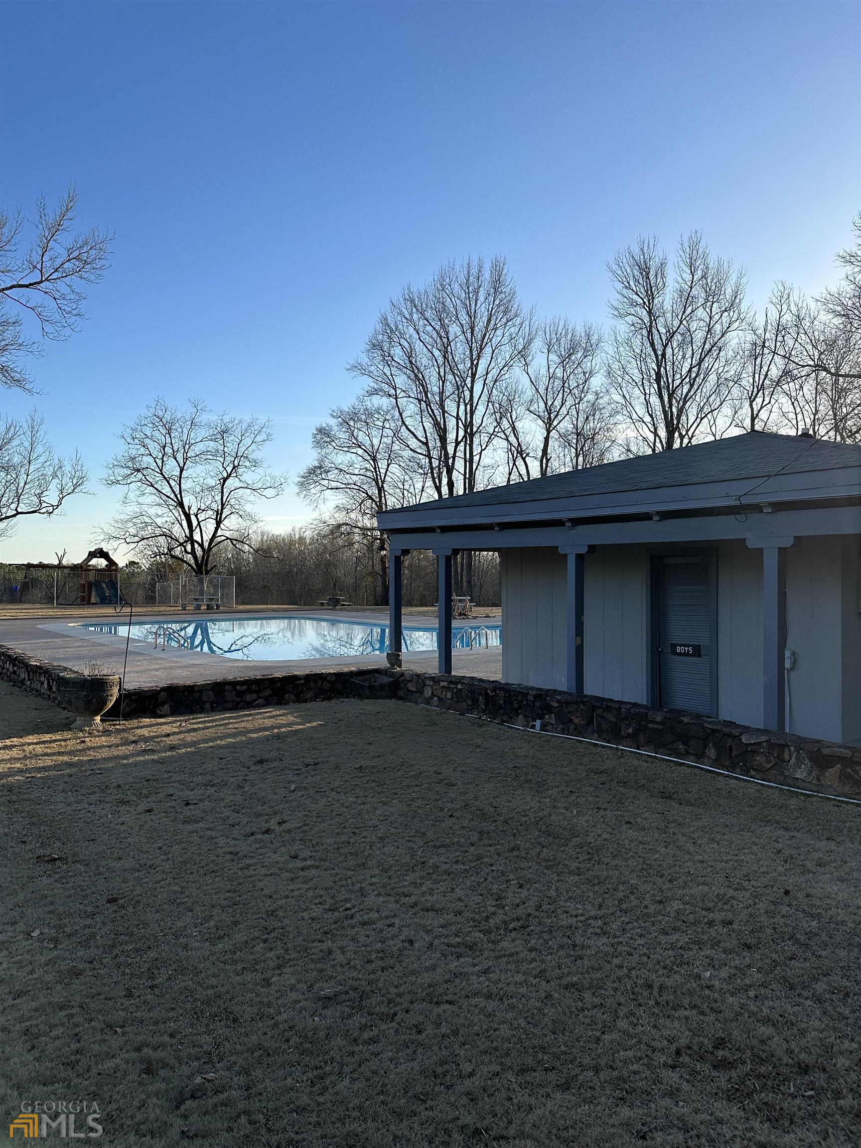 Lot 19 Mountain Ridge Drive Waverly Hall, GA 31831 - Photo 2 of 26 a backyard of a house with lots of green space