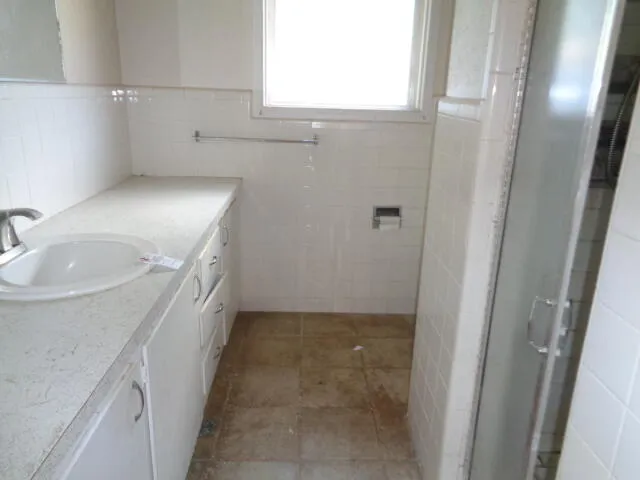 a bathroom with a sink and a bathtub