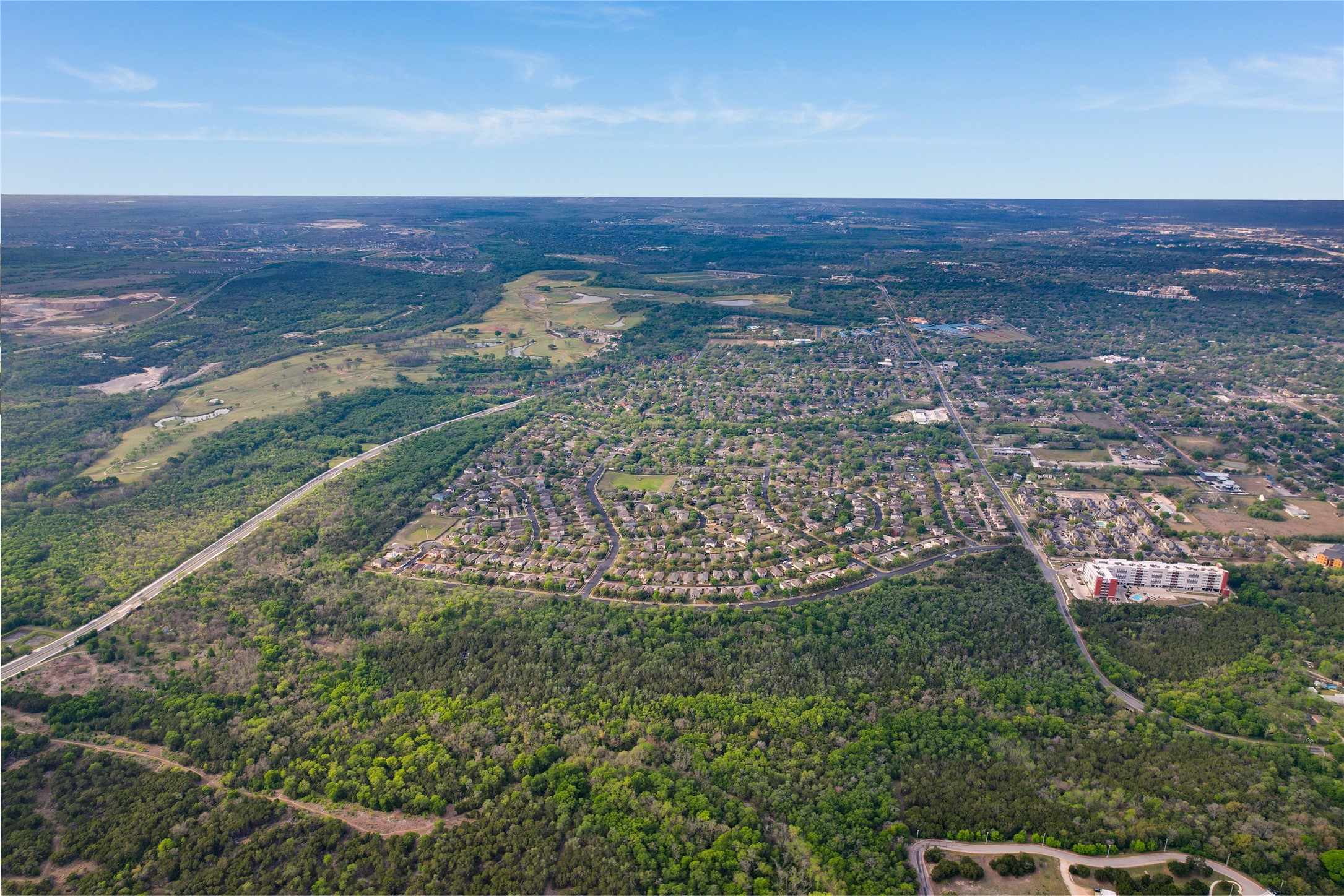 5504 Viewpoint Drive Austin, TX 78744 - Photo 10 of 16 a view of an ocean with a building in the background
