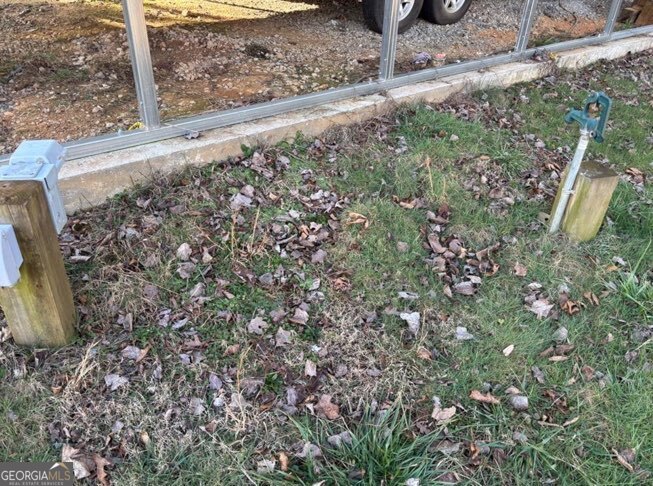 22 Old Bullen Gap Road Blue Ridge, GA 30513 - Photo 14 of 16 a view of a yard with plants and wooden fence