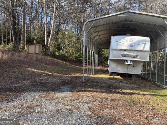 22 Old Bullen Gap Road Blue Ridge, GA 30513 - Photo 16 of 16 a front view of a house with a yard