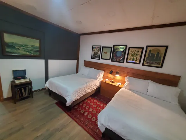 a bedroom with a bed and a couch