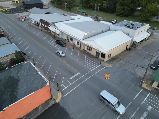 an aerial view of a house with outdoor space