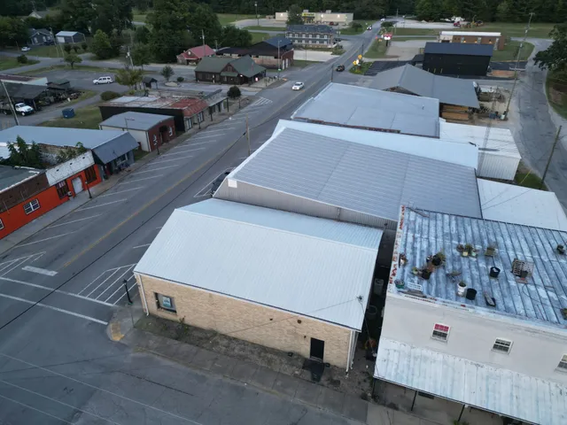 a terrace with outdoor seating and city view