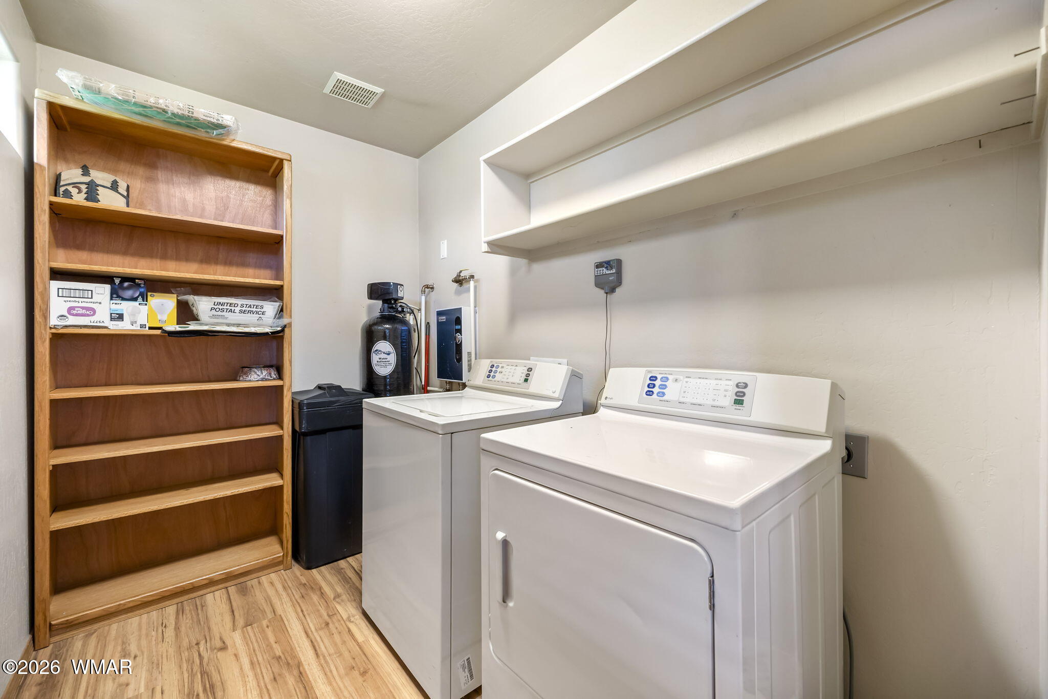 2337 Buffalo Loop Overgaard, AZ 85933 - Photo 14 of 43 a utility room with dryer and washer