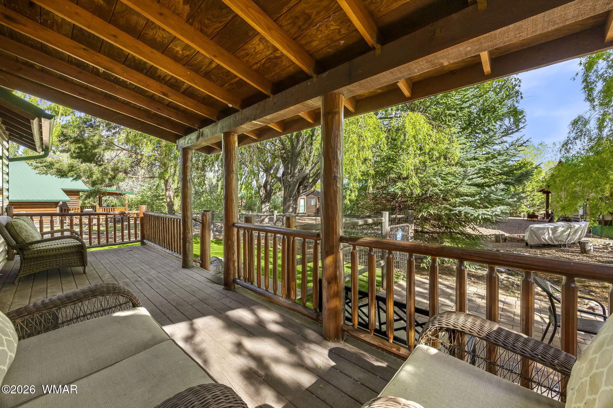 2337 Buffalo Loop Overgaard, AZ 85933 - Photo 23 of 43 a view of a porch with wooden floor