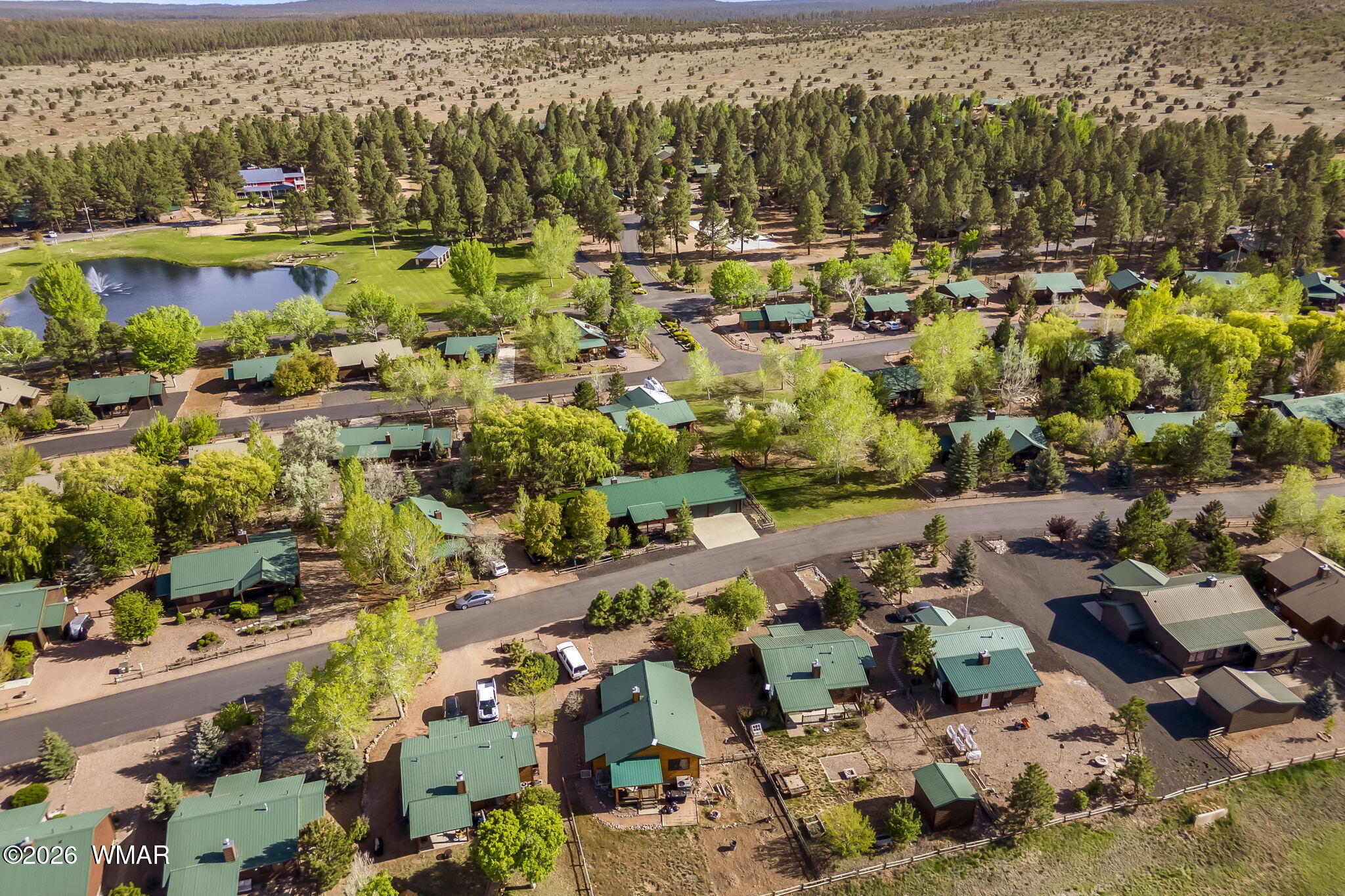 2337 Buffalo Loop Overgaard, AZ 85933 - Photo 32 of 43 an aerial view of residential houses with outdoor space